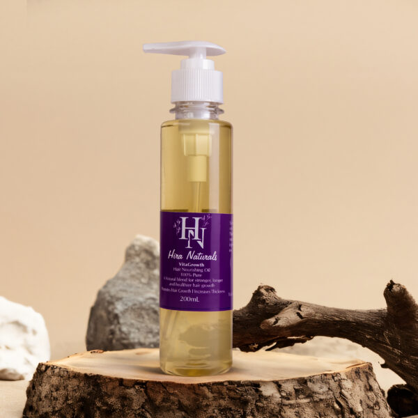 Bottle of Vitagrowth Hair Nourishing Oil by Hira Naturals, displayed with coconut, olive, blackseeds, and rosemary, highlighting its herbal hair growth benefits.