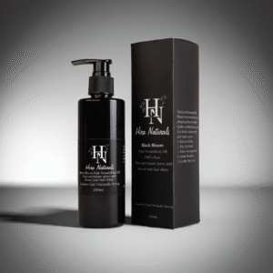 Bottle of Black Bloom Hair Nourishing Oil by Hira Naturals placed on a clean background, showcasing herbal ingredients for strengthening and shine.